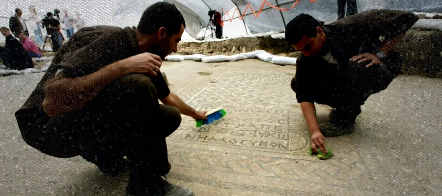 In 2005, an 1,800 year old mosaic claiming Jesus Christ is God was discovered while expanding a prison.  The picture shows prisoners cleaning the mosaic.